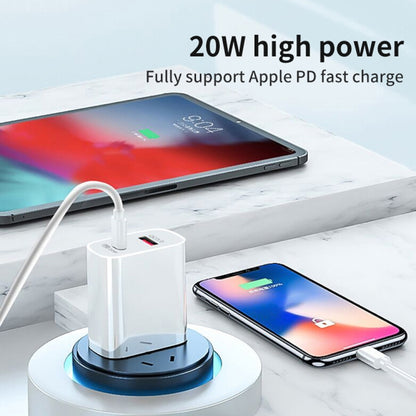 White UK plug dual USB fast charger powering a smartphone and tablet