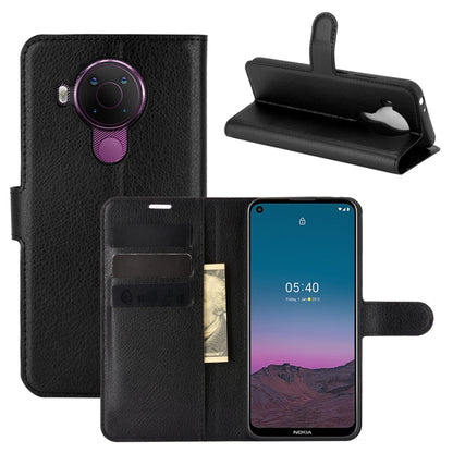 Black litchi-texture flip protective phone case with card slots and stand holder