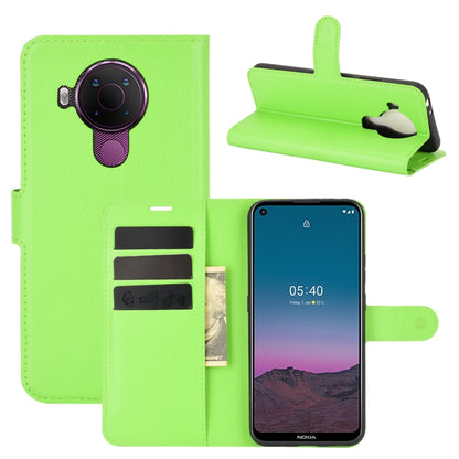 Green litchi-texture wallet flip case with card slots for Nokia 5.4, stand view