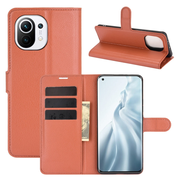 Brown flip phone wallet case with card slots and holder strap for Xiaomi Mi 11