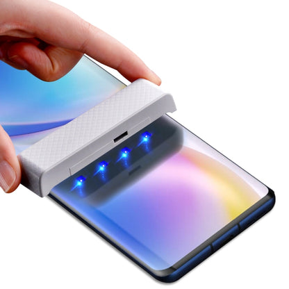 Tempered glass screen protector film applied to OnePlus 9 Pro with alignment tool
