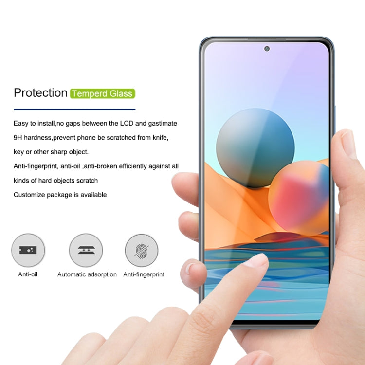 Tempered glass screen protector film on smartphone, hand holding and aligning