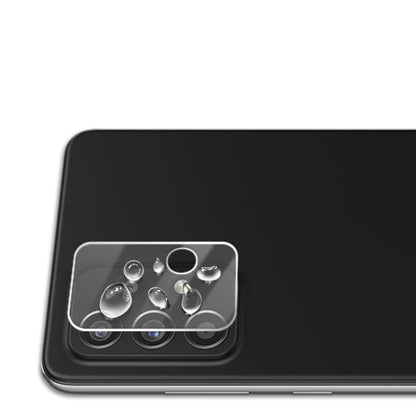 Tempered glass lens shield covering multiple rear camera lenses on a phone