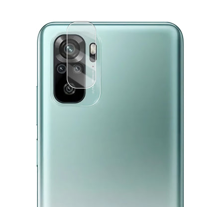 Transparent tempered glass rear camera lens shield with rounded edges on phone back.