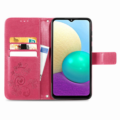 Rose red leather wallet phone case open with card slots and embossed floral panel.