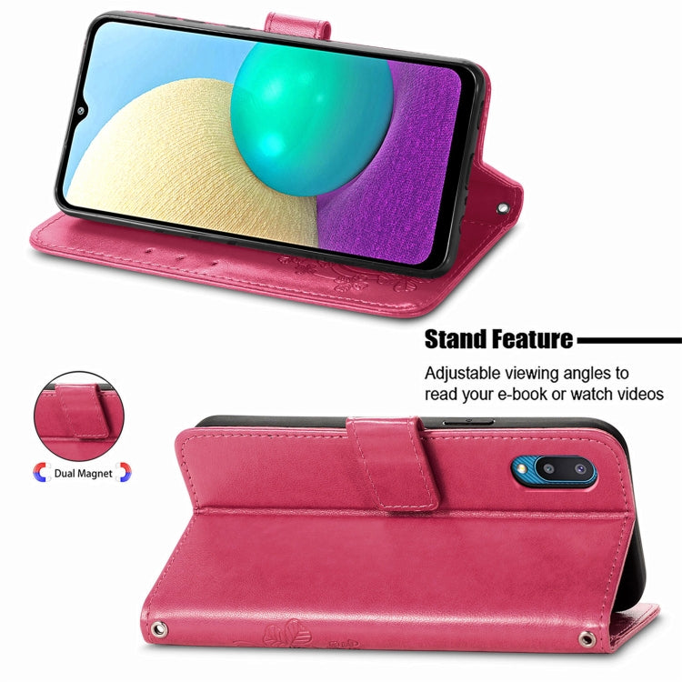 Rose red leather folio phone case with stand feature for angled viewing.