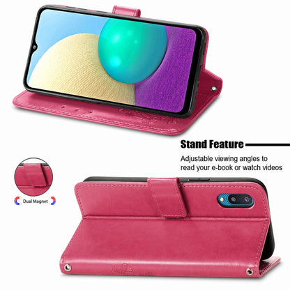 Rose red leather folio phone case with stand feature for angled viewing.