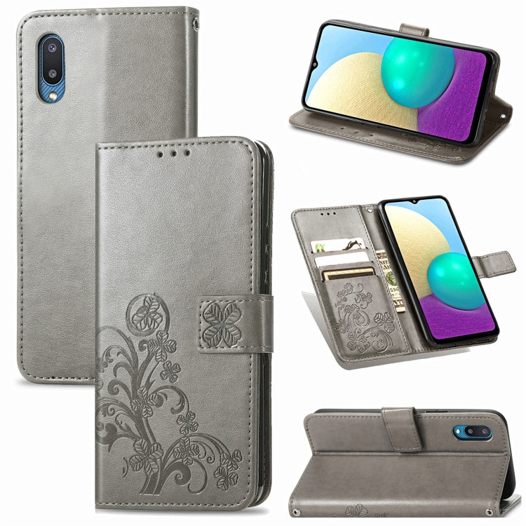 Grey leather wallet phone case with embossed floral pattern and card slot front flap.