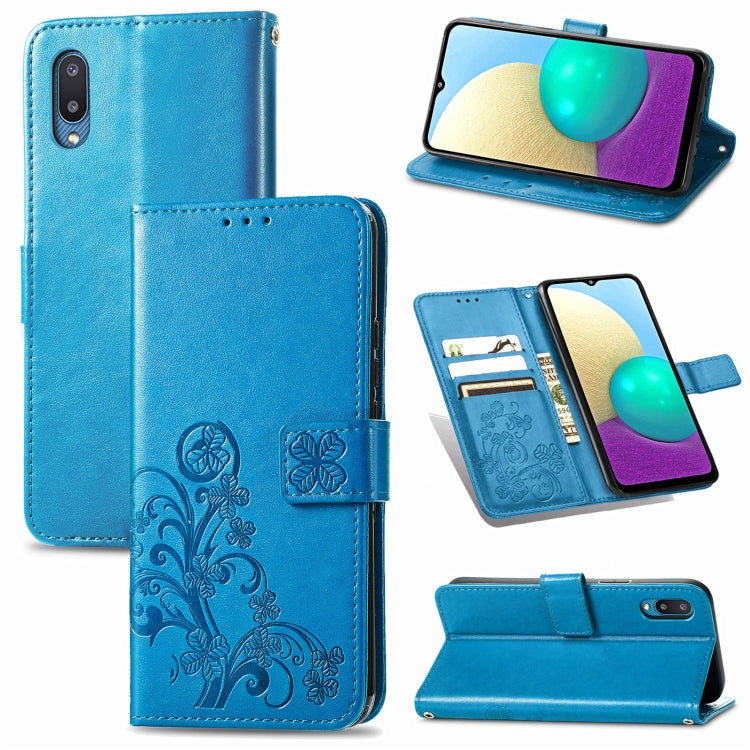 Blue leather wallet phone case with embossed floral design and front cover clasp.