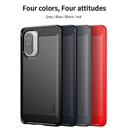 MOFI carbon-fiber TPU phone cases in grey, blue, black, and red