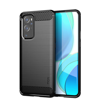 Soft TPU phone case for OnePlus 9, black carbon-fiber texture, raised camera edges