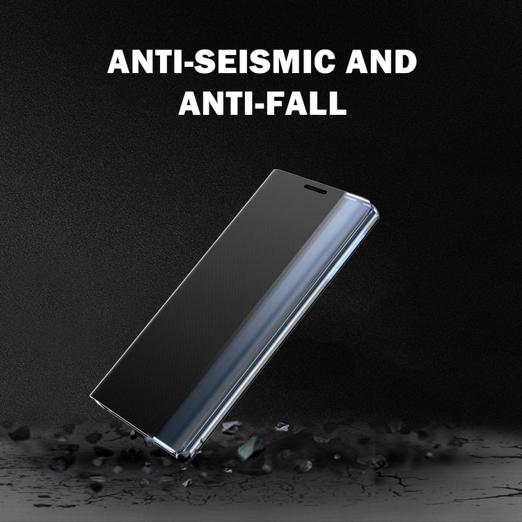 Dark gray flip leather phone case with textured cover, angled on its side.