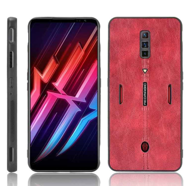 Shockproof phone case with red textured back and side buttons, cutouts for camera and ports
