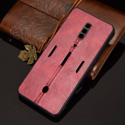 Shockproof phone case with red textured back and camera cutout, shown on phone
