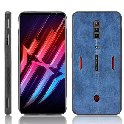 Shockproof phone case with blue textured back, cutouts for camera and side buttons