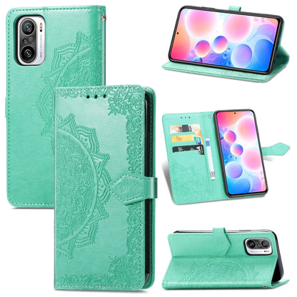 Teal embossed mandala leather phone wallet case with card slots and kickstand