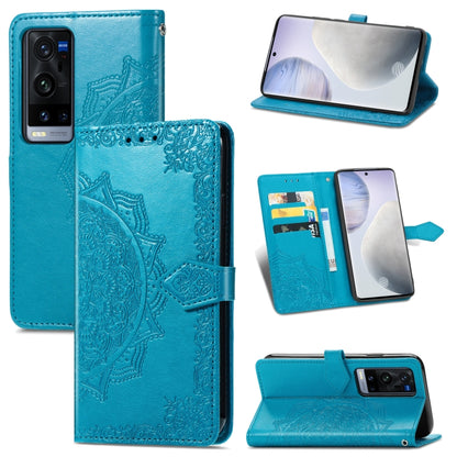 Blue mandala-emboss leather flip phone case with card slots and open stand view.