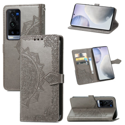 Grey mandala-emboss leather flip phone case with card slots and open stand view.