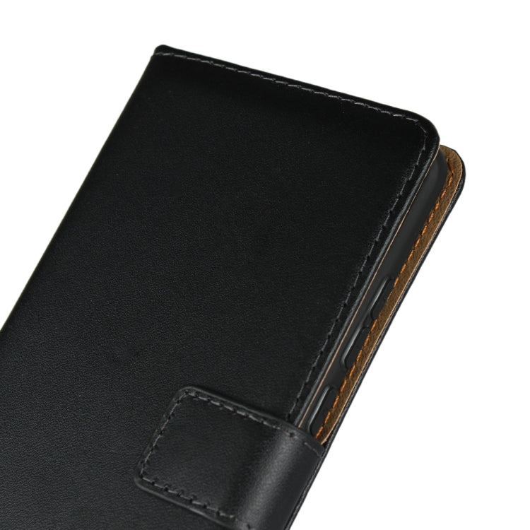 Black leather flip holster wallet case close-up with inner card slot tab