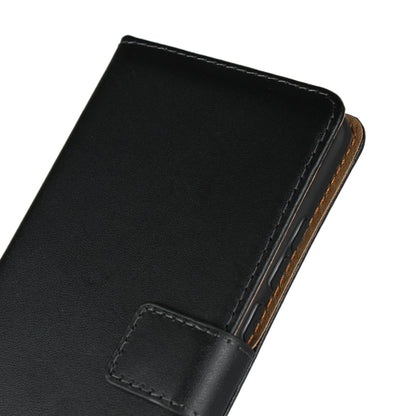 Black leather flip holster wallet case close-up with inner card slot tab