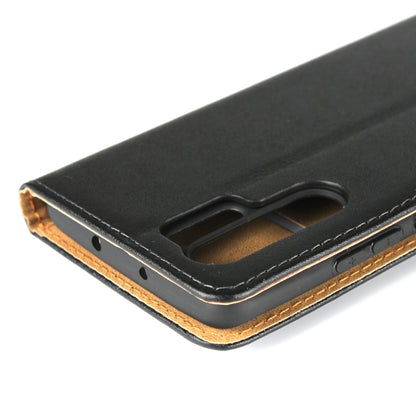 Black leather case bottom close-up with speaker and charging port openings