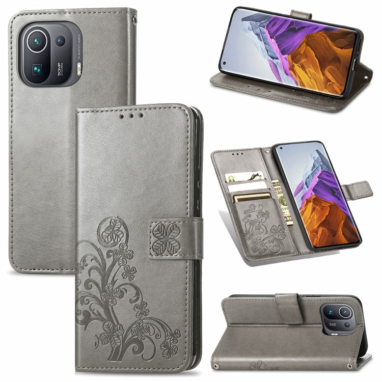 Four-leaf Clasp Embossed Buckle Mobile Phone Protection Leather Case with Lanyard & Card Slot & Wallet & Bracket Function, For Samsung Galaxy A22 5G, For Samsung Galaxy A22 4G, For Samsung Galaxy F62/M62, For Samsung Galaxy S21 FE, For OPPO A54  4G    ...