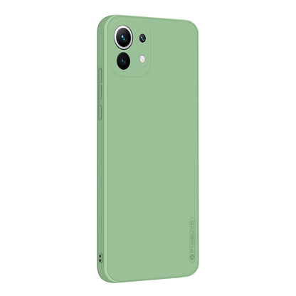 Green silicone TPU phone case with camera cutouts, slim protective back cover.