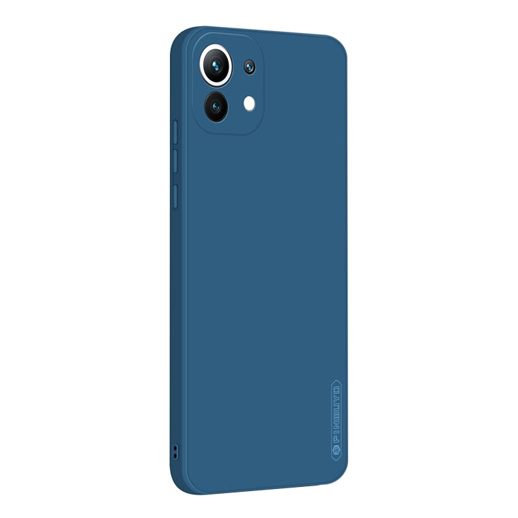 Blue silicone TPU phone case, back view with camera cutouts and side button openings.