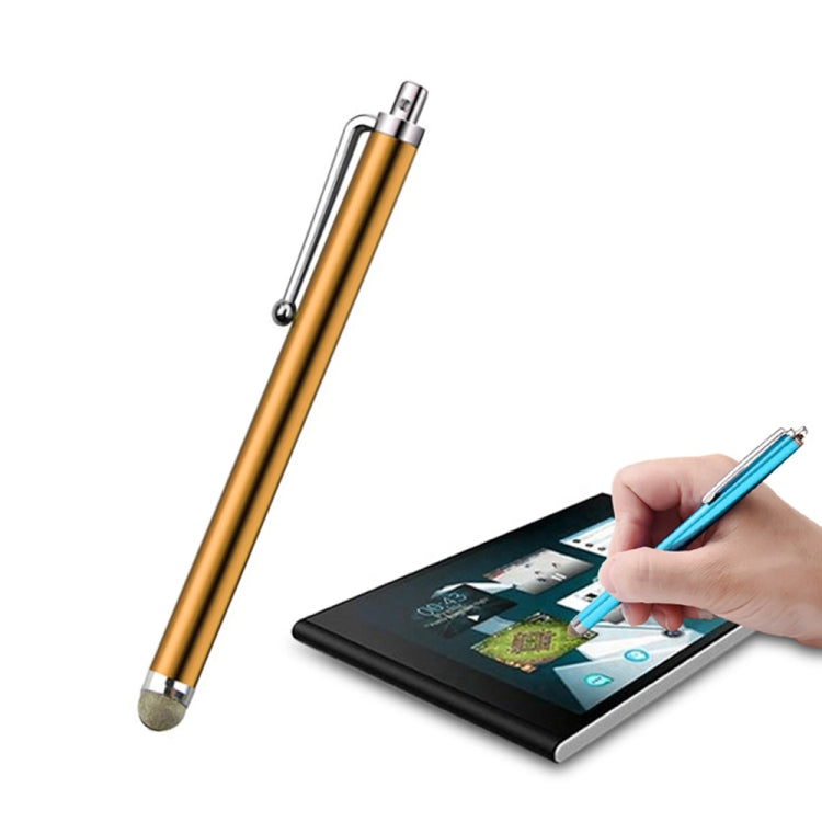 Capacitive stylus pen with gold body and fiber tip, used on tablet touchscreen