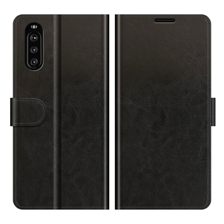 Black textured wallet flip phone case with camera cutout and magnetic closure.