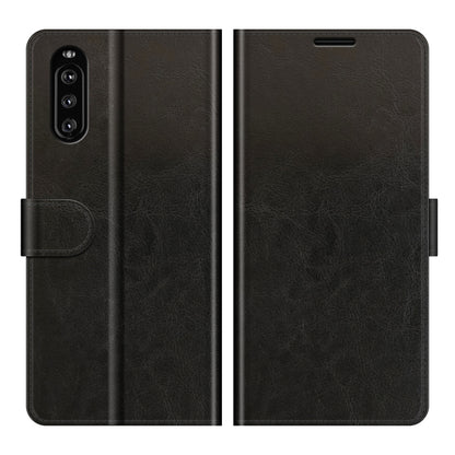 Black textured wallet flip phone case with camera cutout and magnetic closure.