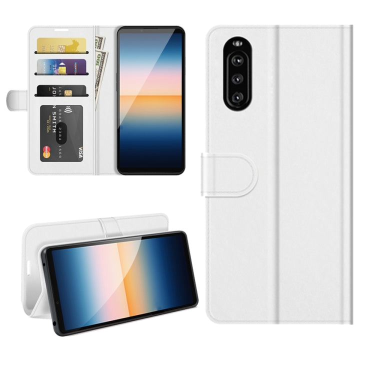 White flip protective phone case with card slots, camera cutout, and stand.