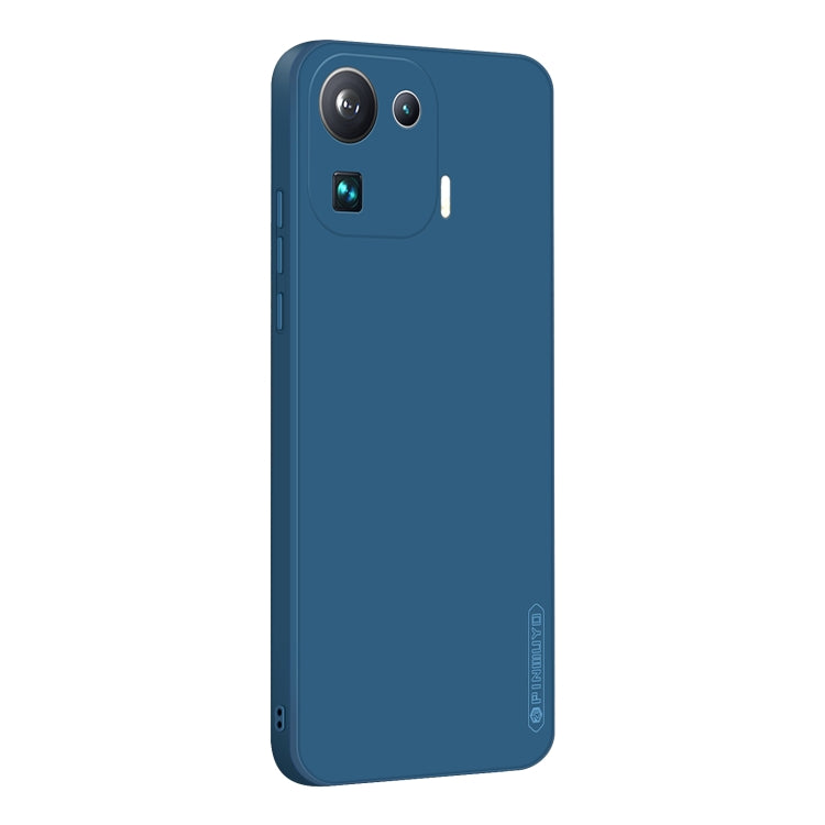 Blue silicone TPU phone case with camera openings and side button cutouts