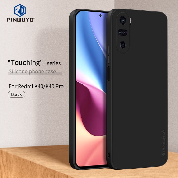 Black liquid silicone TPU phone case covering a smartphone, with camera cutouts