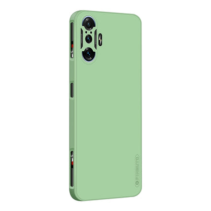 Green liquid silicone TPU phone case showing side profile with openings for ports