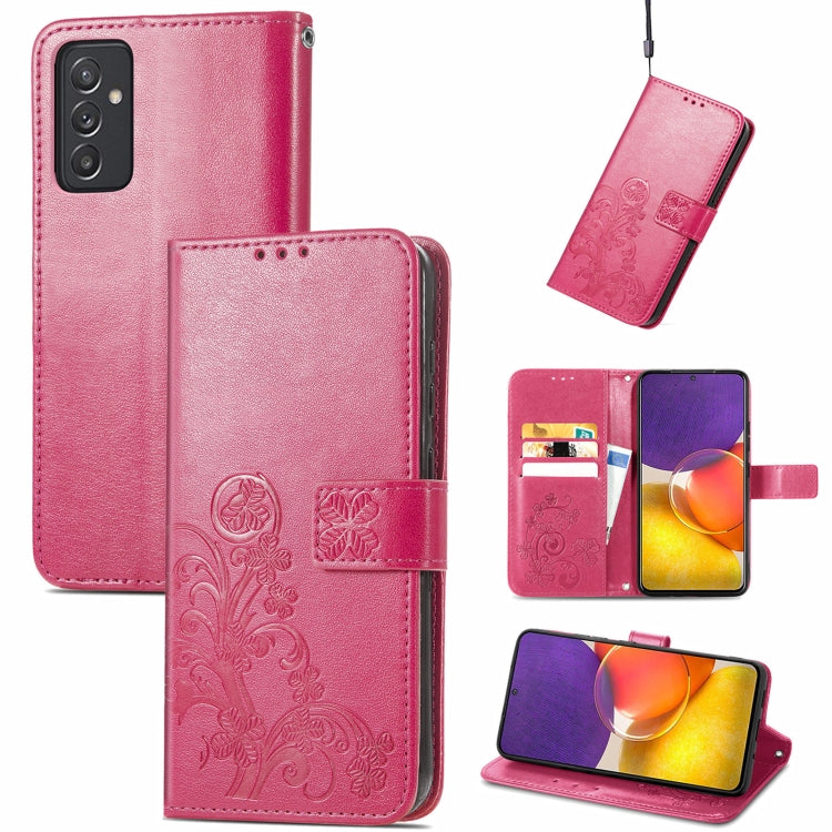 Pink embossed leather wallet phone case with lanyard, card slots, and stand