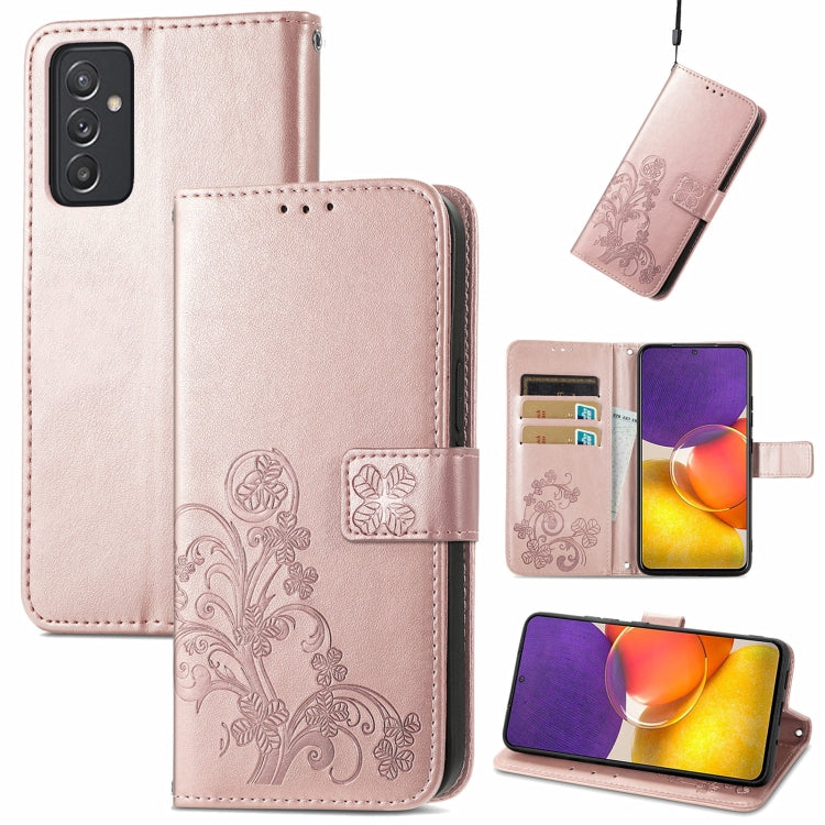 Rose pink leather wallet phone case with embossed floral design, clasp, card slots, lanyard