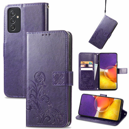 Purple leather wallet phone case with embossed floral pattern, clasp, card slots, lanyard