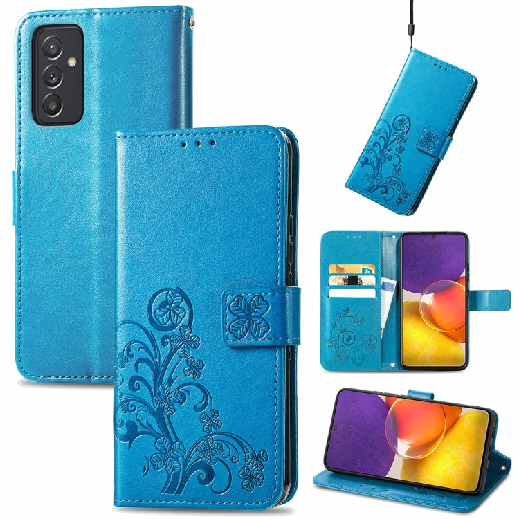 Blue leather wallet phone case with embossed floral pattern, clasp, card slots, lanyard