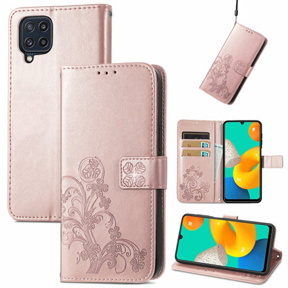 Rose pink leather wallet phone case with embossed floral design, clasp, card slots, lanyard
