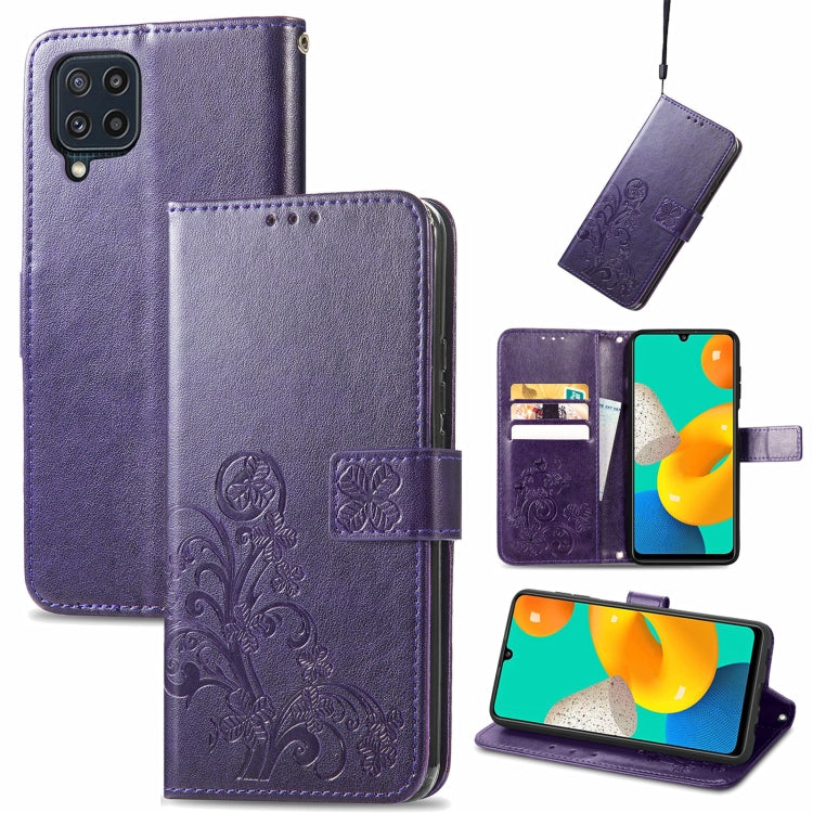 Dark purple leather wallet phone case with embossed floral pattern, clasp, card slots, lanyard