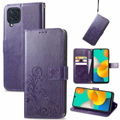 Dark purple leather wallet phone case with embossed floral pattern, clasp, card slots, lanyard