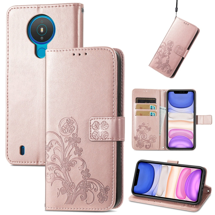 Pale pink leather wallet phone case, embossed floral, lanyard, card slots, stand