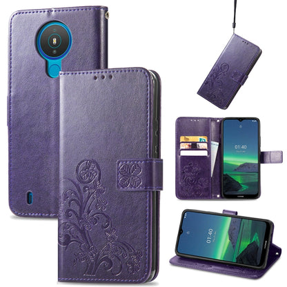 Dark purple embossed leather wallet phone case with lanyard, card slots, and flip stand