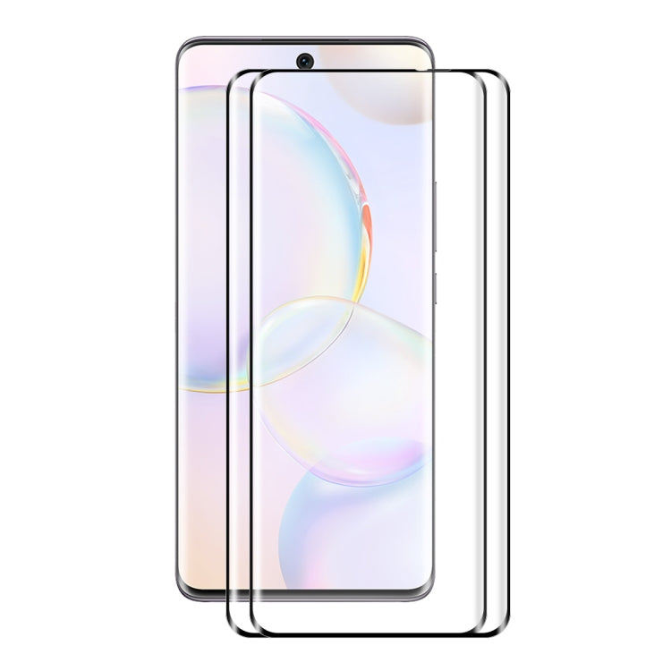 Curved tempered glass screen protector pair with full-coverage fit on a smartphone front.