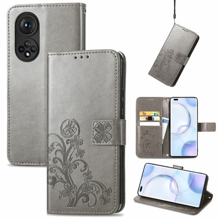 Light gray embossed leather wallet phone case with four-leaf clasp, lanyard, card slot, stand