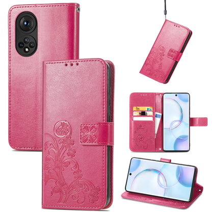 Pink embossed leather wallet phone case with four-leaf clasp, lanyard, card slot, stand