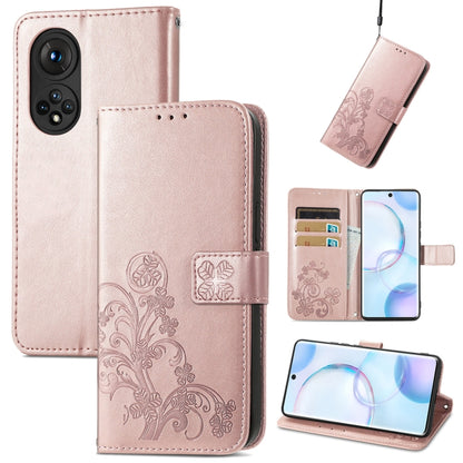 Light pink embossed leather wallet phone case with four-leaf clasp, lanyard, card slot, stand