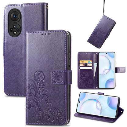Purple embossed leather wallet phone case with clasp, lanyard, and card slots