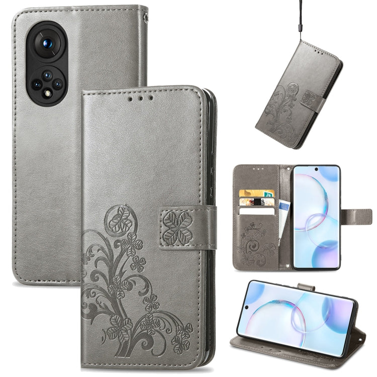 Light gray embossed leather wallet phone case with clasp, lanyard, and card slots
